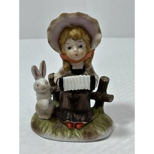 Vintage Porcelain Girl On Fence Playing Accordion with Bunny Rabbit Figurine